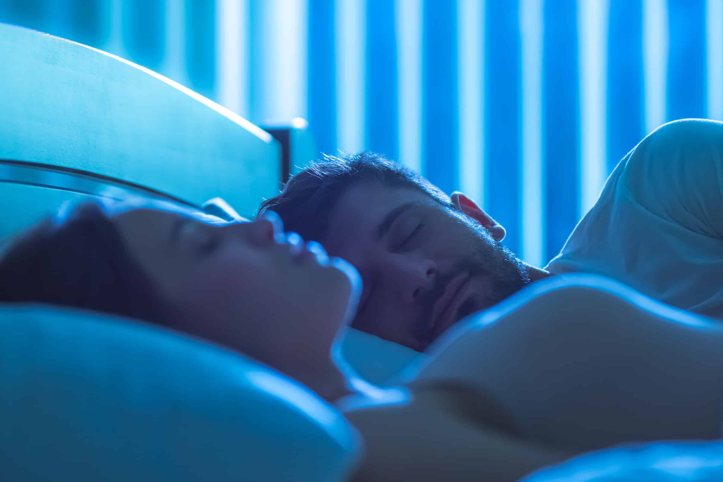 sleep apnea resolved couple sleeping peacefully